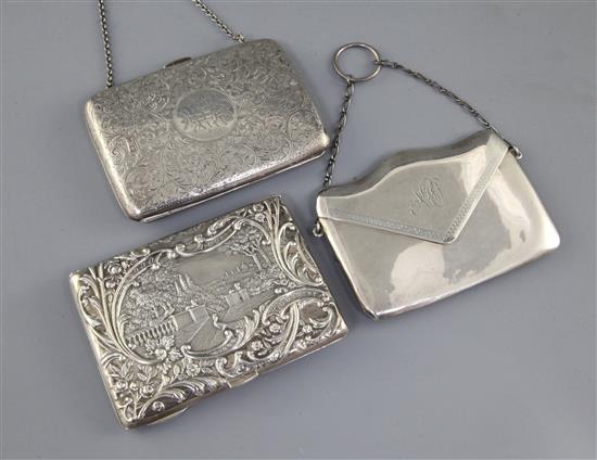 Two late Victorian/Edwardian silver mounted card purses, both with aide memoir and a George V silver envelope card case,